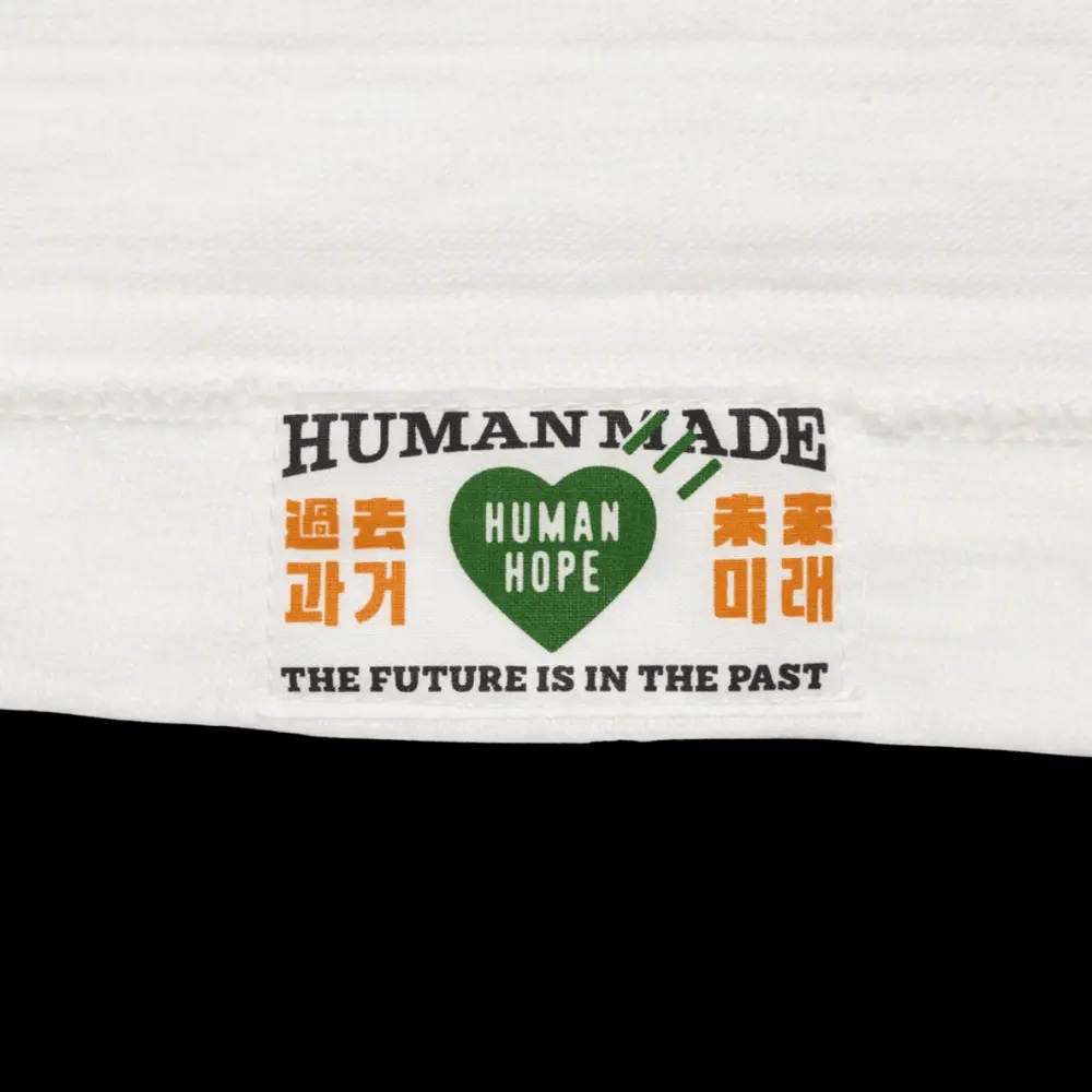 HUMAN HOPE GRAPHIC T-SHIRT WHITE | AREA 02 — Asia's Premier